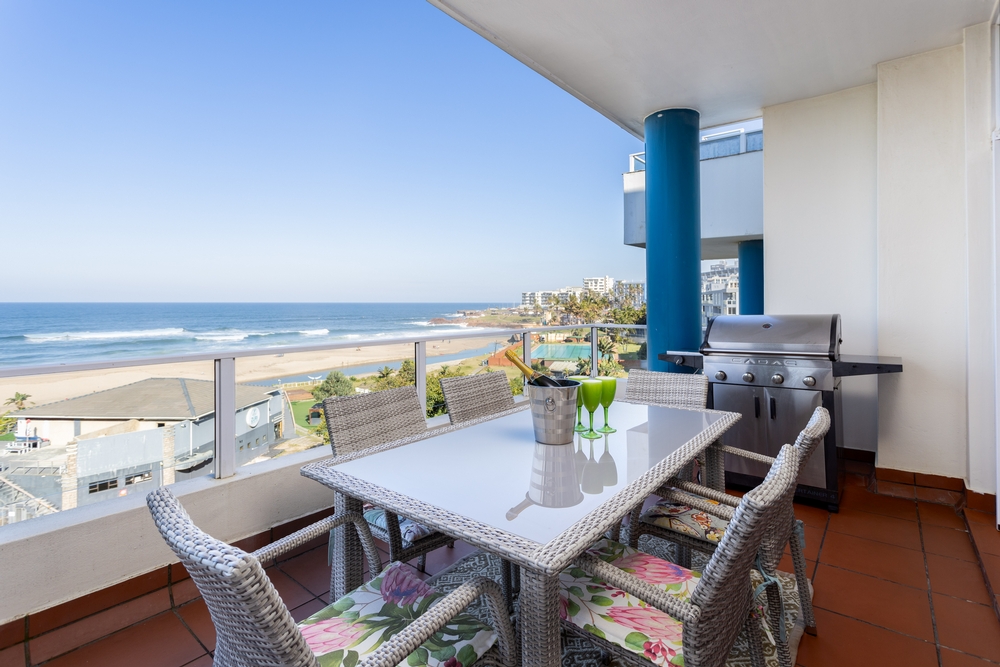 Colonial Sands 403: Colonial Sands 403  Spacious Balcony with a gas braai.